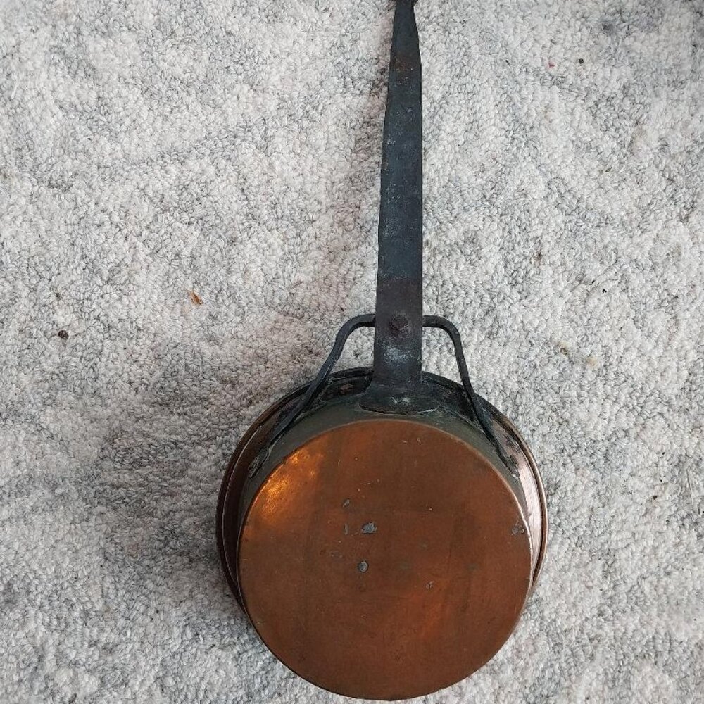 Antique copper pan with wrought iron handle